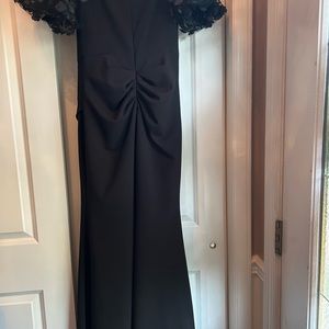 Off shoulder gown with floral sleeve